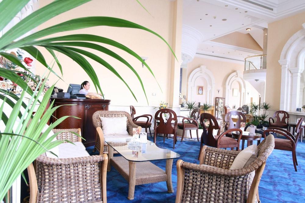 Grand Continental Hotel Абу-Дабі Ресторан фото